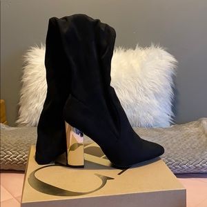 Black thigh high boots